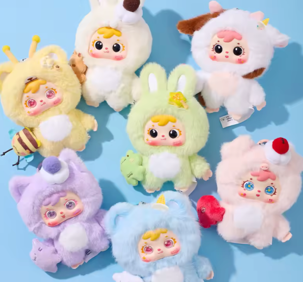 Set of colorful plush toys with animal-themed designs on a blue background